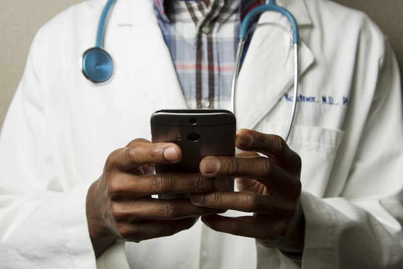 Registered nurse reviewing patient paperwork before a vitamin shot